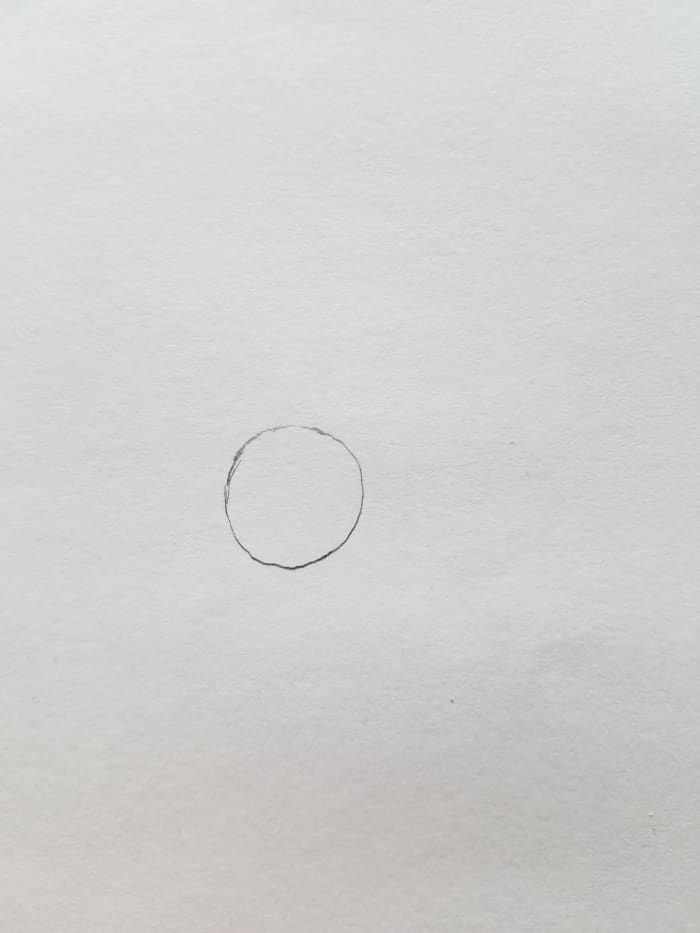 Um mit dem Zeichnen Ihres Bootleg Bart Simpson zu beginnen, beginnen Sie mit dem Auge. Zeichne einen Kreis. Dieser einfache Kreis ist eine großartige Möglichkeit, die Größe Ihres Bootleg-Bart zu messen oder einfach ein Skelett von Punkten zu erstellen.