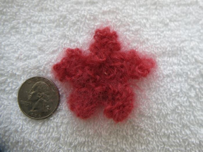 la plus petite fleur en tricot