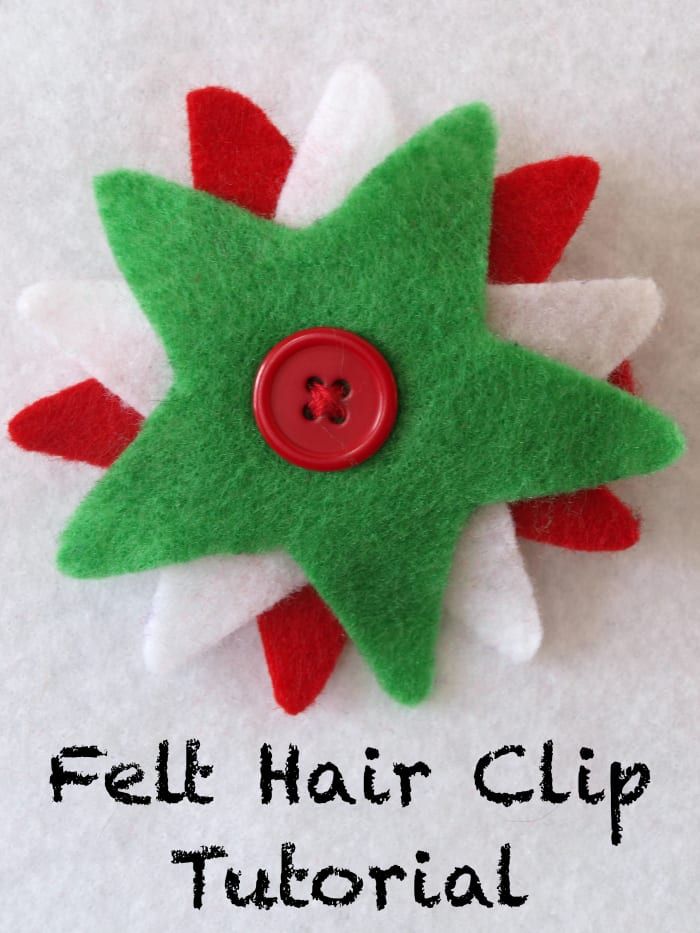 Weihnachtsfarben und eine Stern-Ausstechschablone machten diese festliche Haarspange. Der Knopf dient als Dekoration sowie als Mechanismus zum Anbringen des Designs am Clip.
